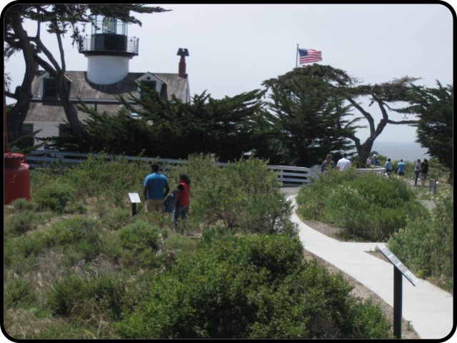 Buoy and path to lighthouse